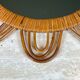 Rattan mirror representing a sun