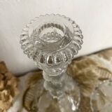 Pair of moulded glass candlesticks, ram heads and masks