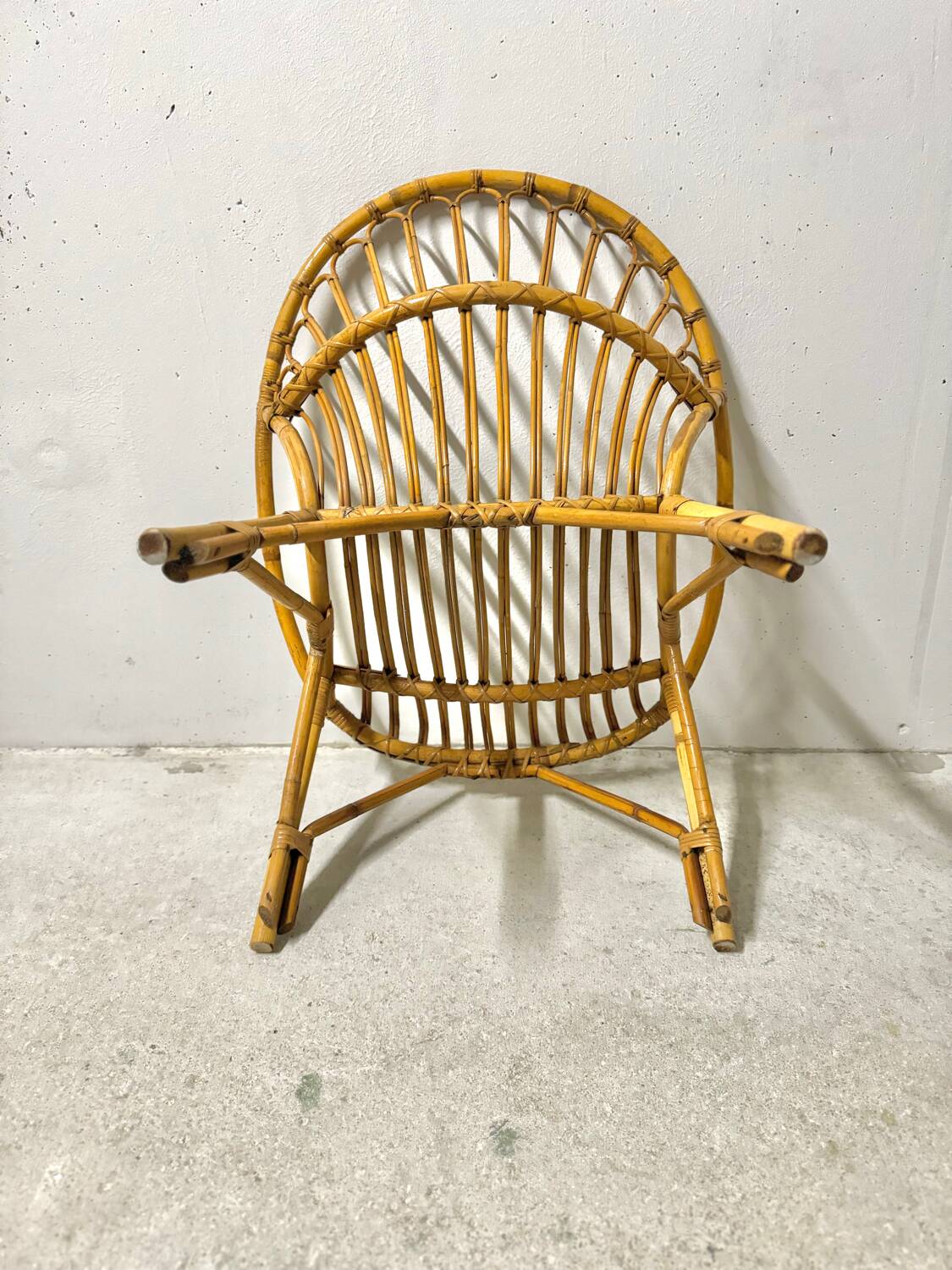 Adult basket armchair in vintage wicker rattan 1960s