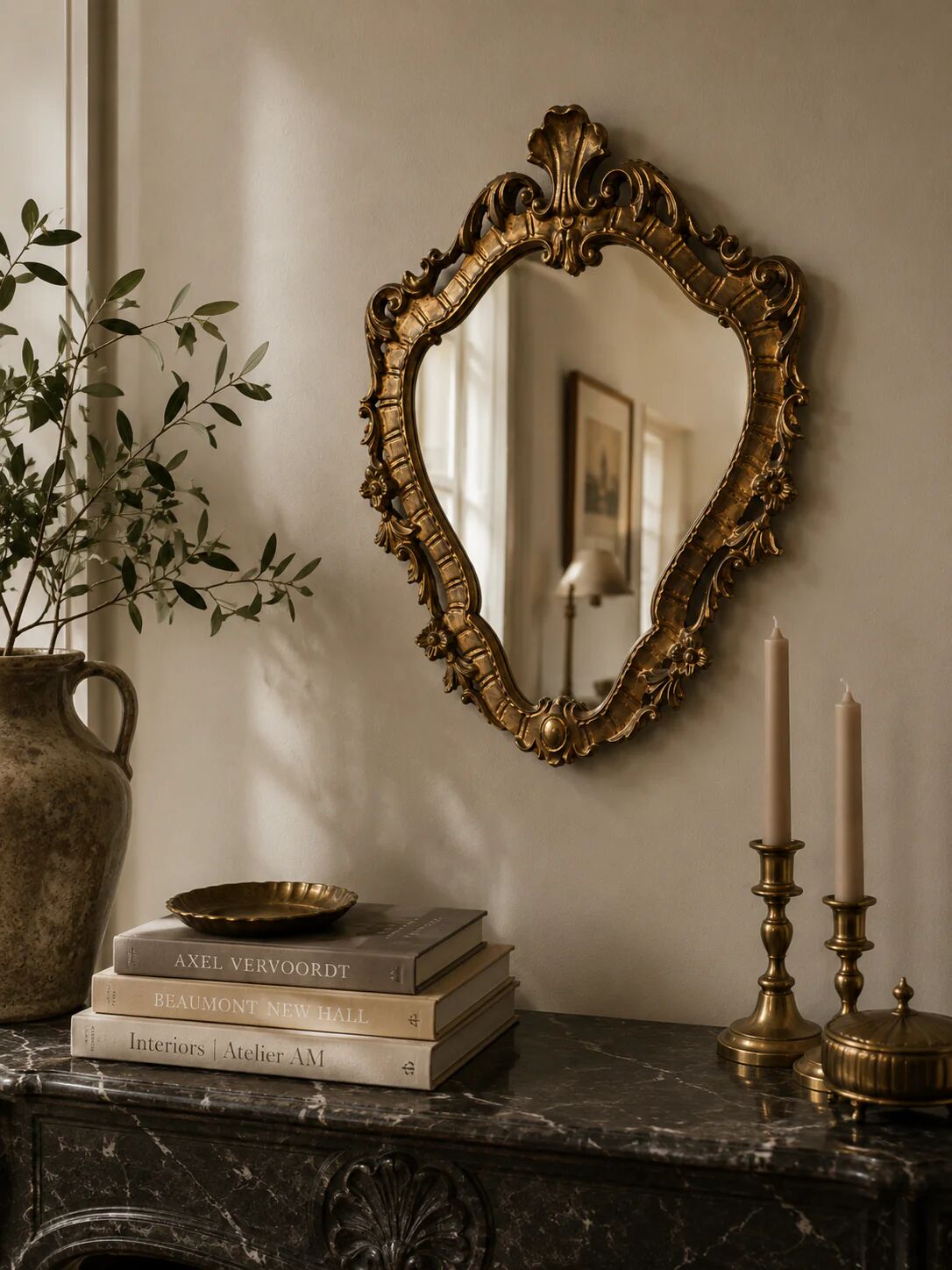 Golden rococo wall mirror