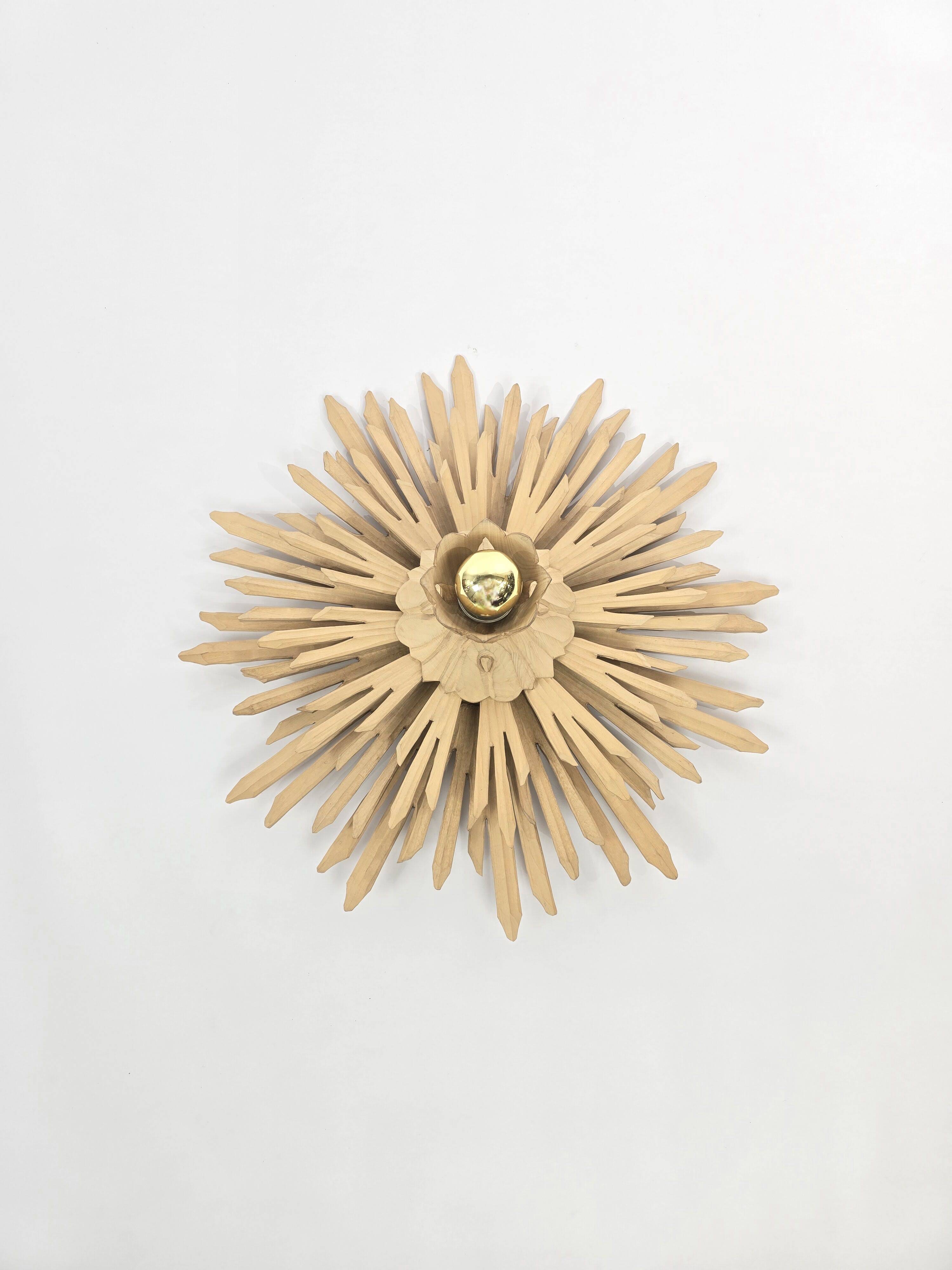 Giant sunburst wall lamp