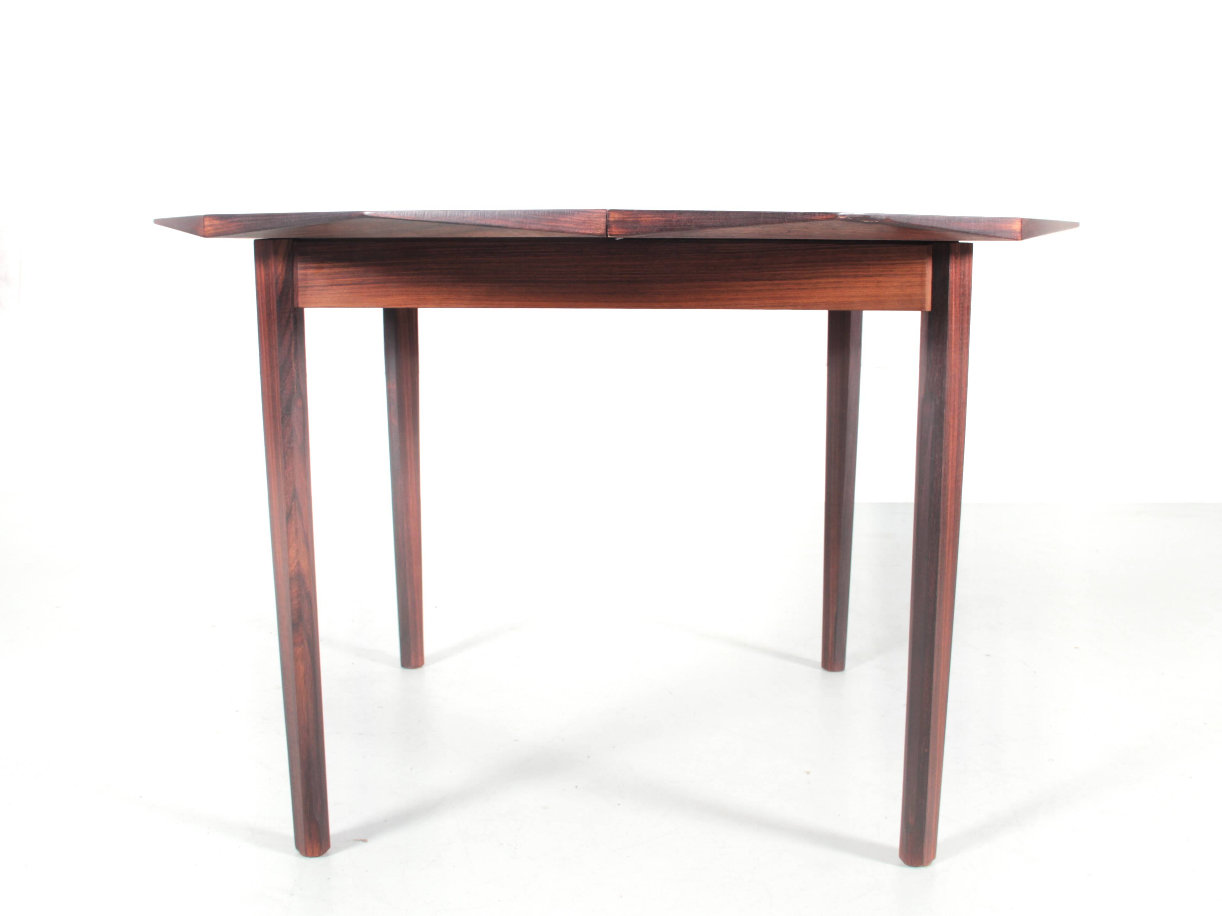 Rio rosewood dining table for 4/8 people.