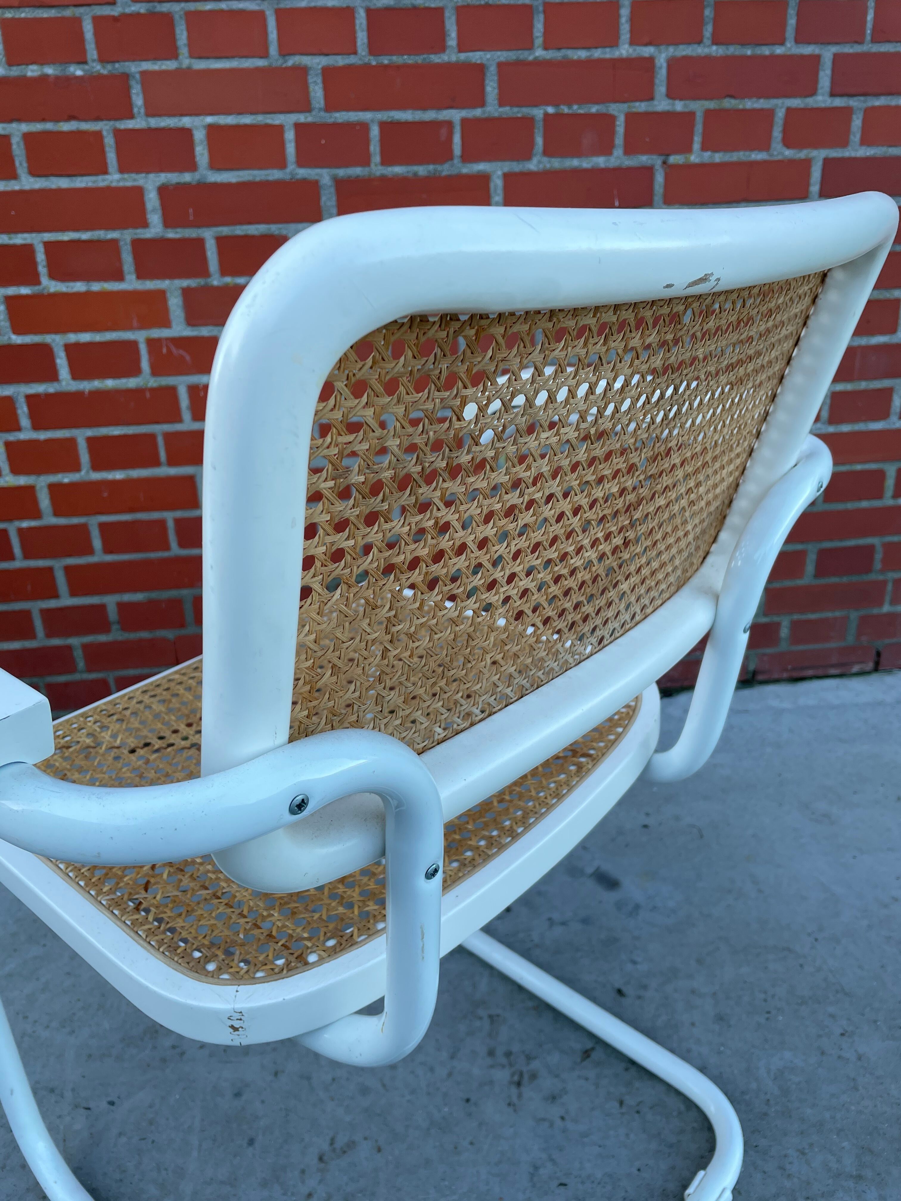 Cesca Chair model with armrest in white