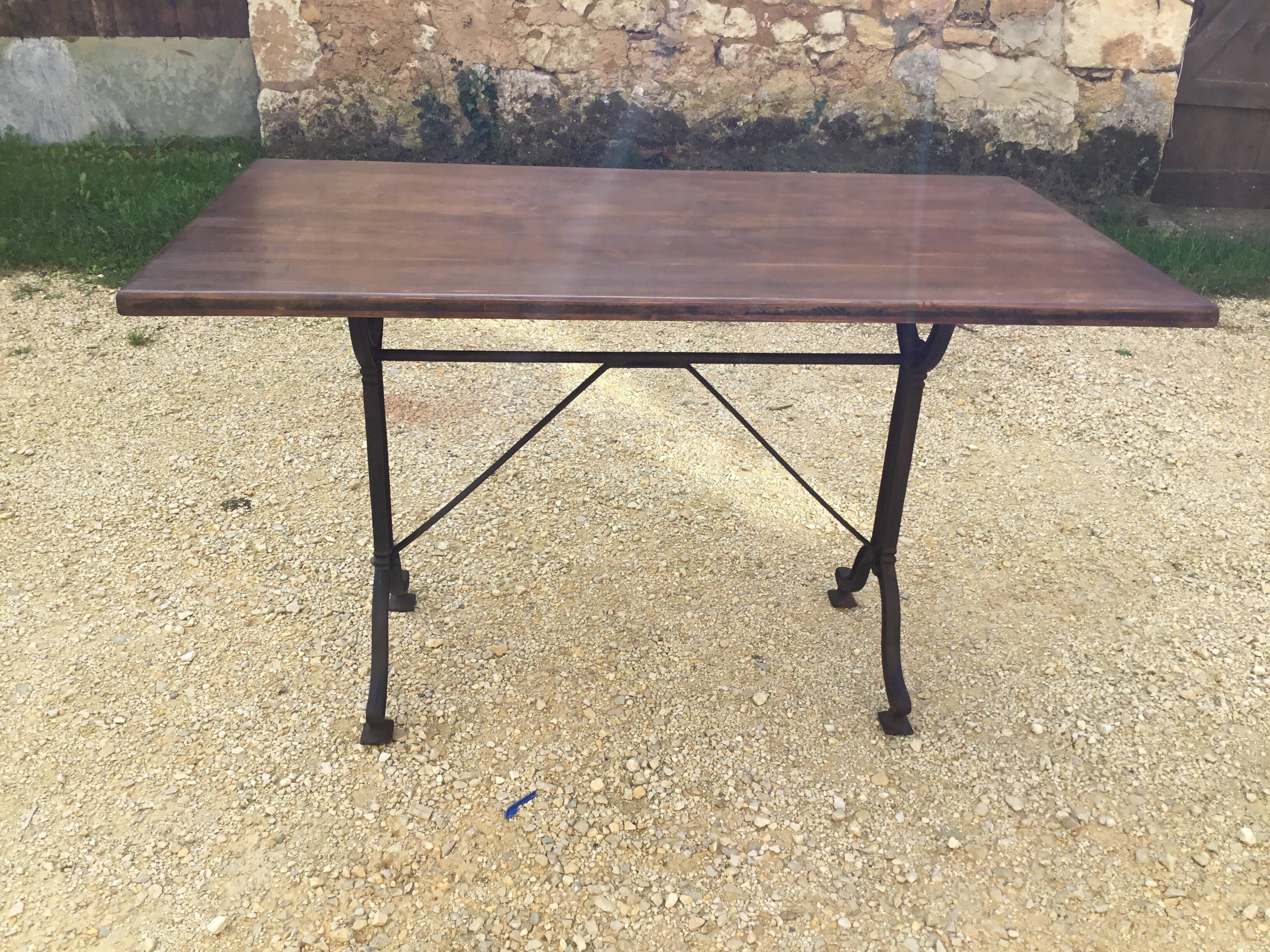 Cast iron and wood bistro table