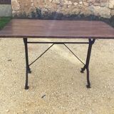 Cast iron and wood bistro table