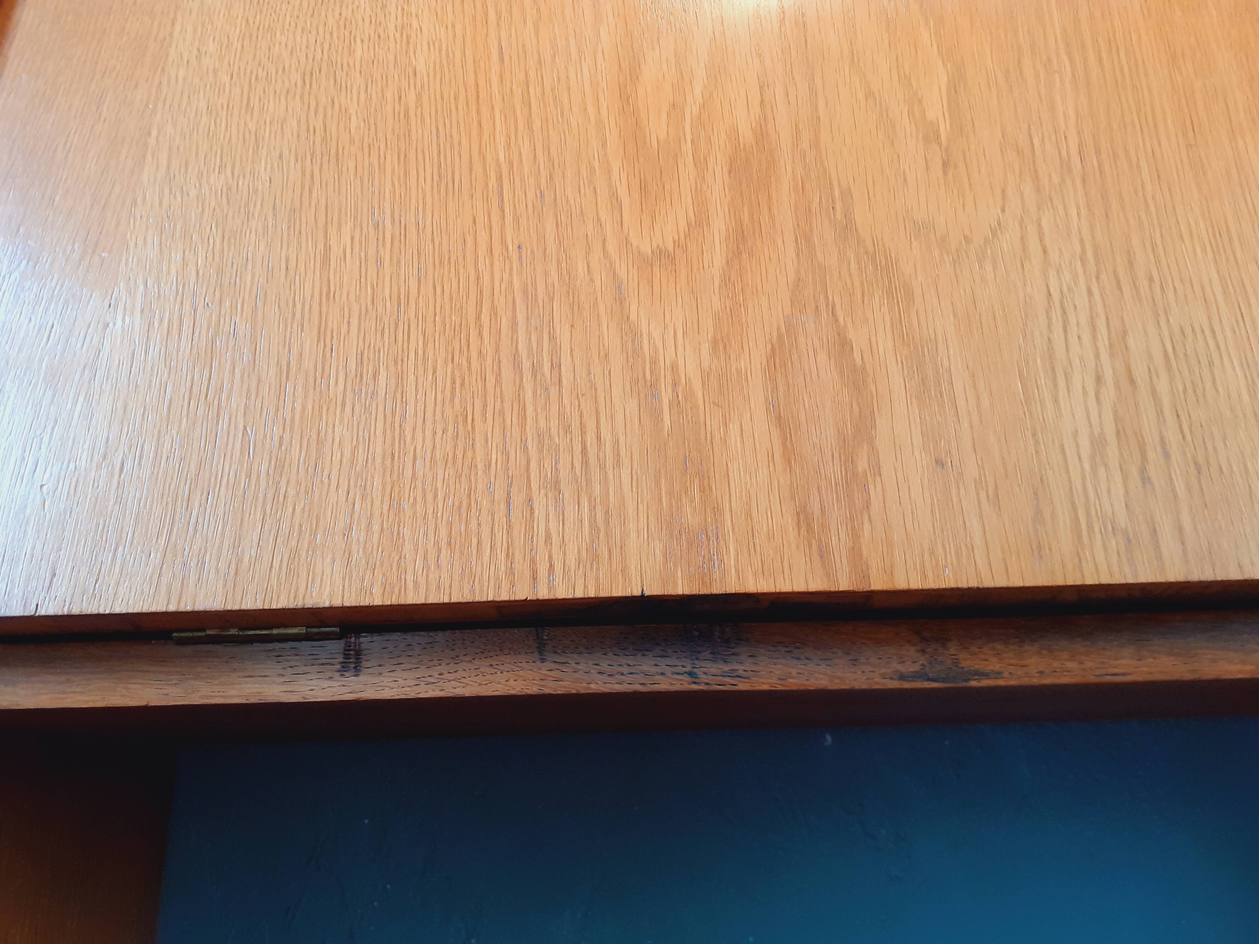 Wall-mounted oak desk from the 1950s.