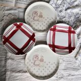 Vintage mismatched earthenware dessert plates with red patterns