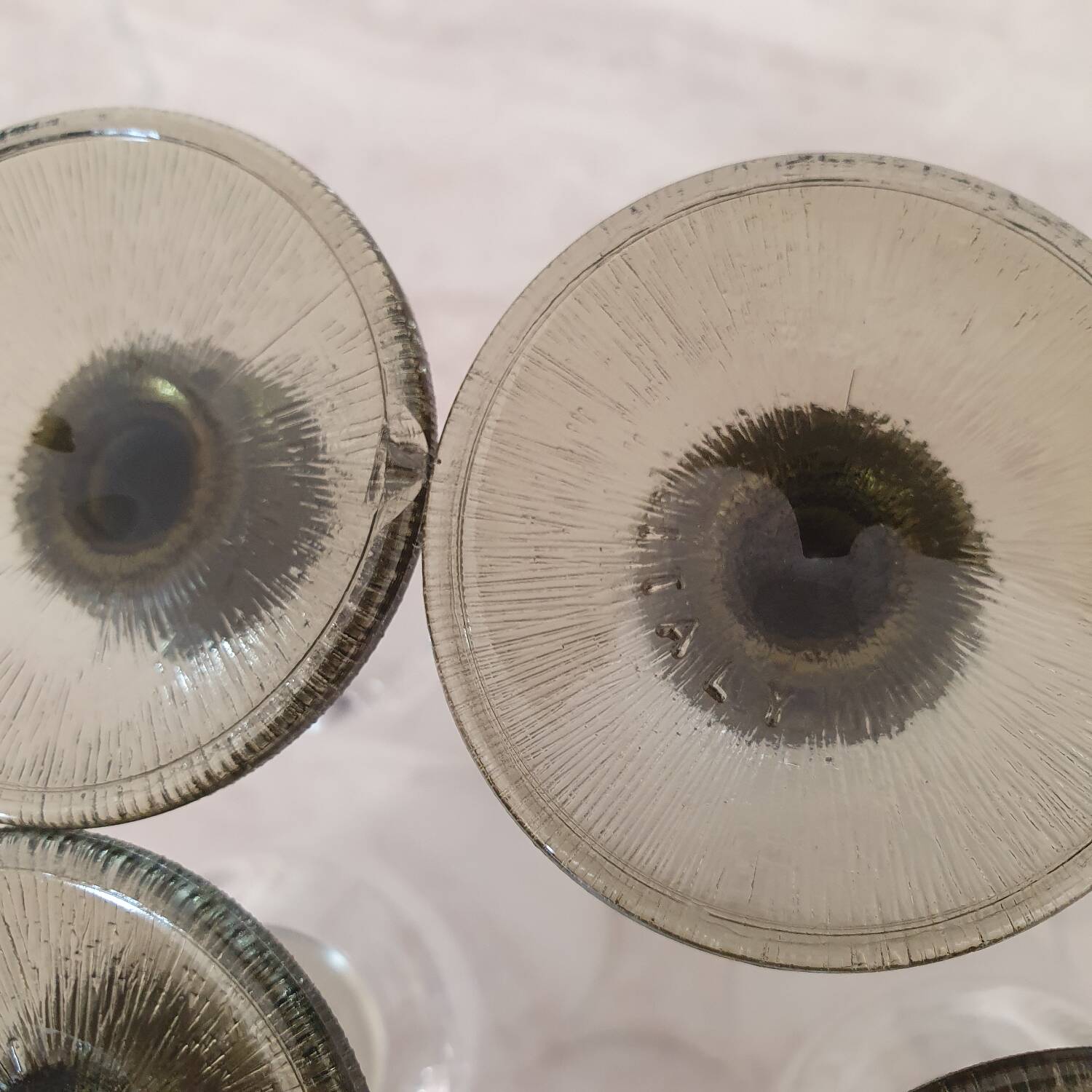 6 small green foot flutes in the Timo Sarpaneva style