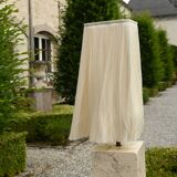 Beige marble stucco base, Houles white ecru fringed lampshade.