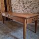 18th-century French farmhouse dining table in oak and chestnut.