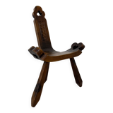 Brutalist hand carved oak Spanish tripod chair , 1970s