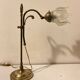 Brass table lamp with a glass shade