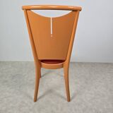12 orange Baumann chairs 1970s