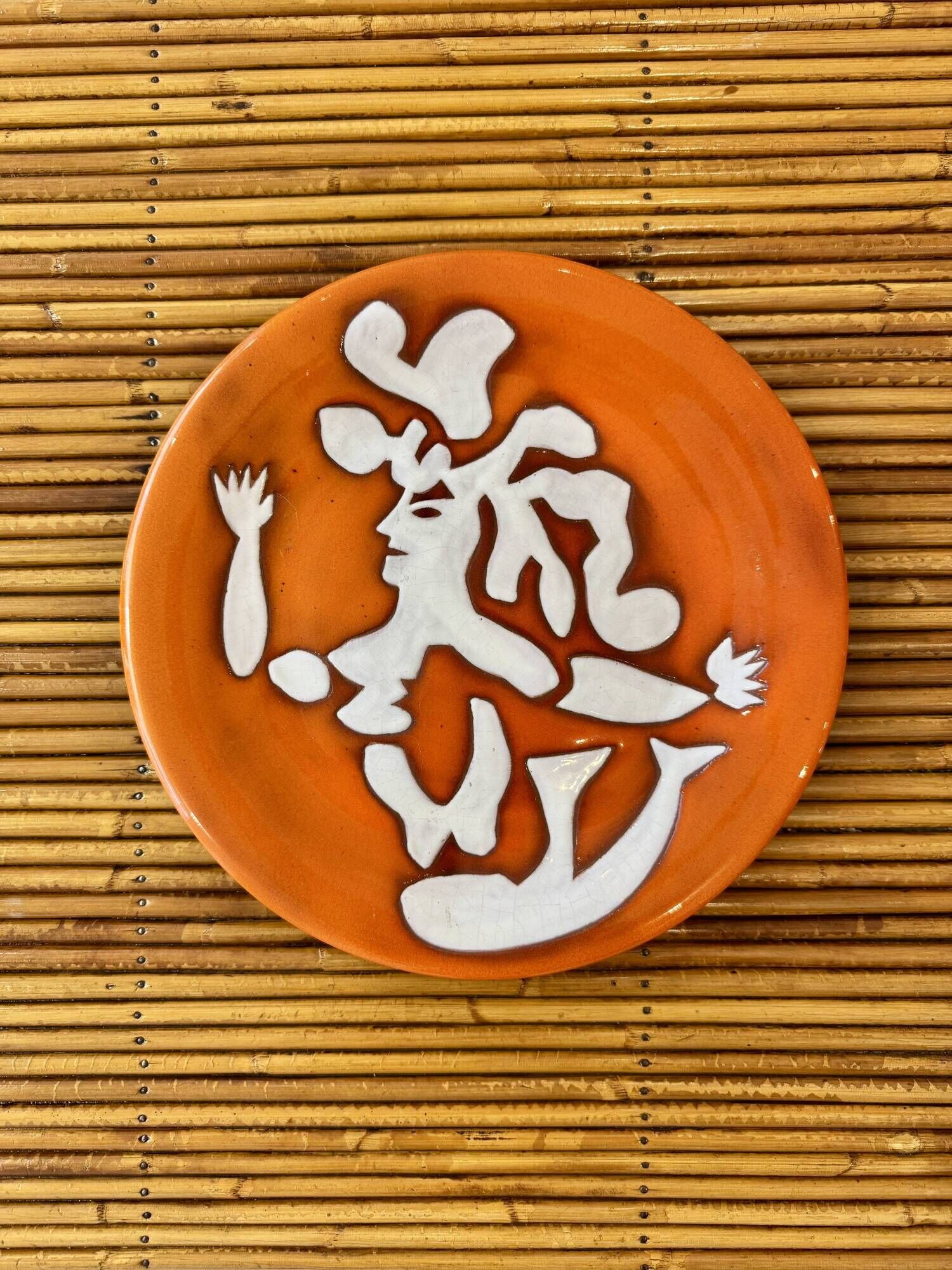 Jean lurcat in saint vicens orange enameled ceramic plate