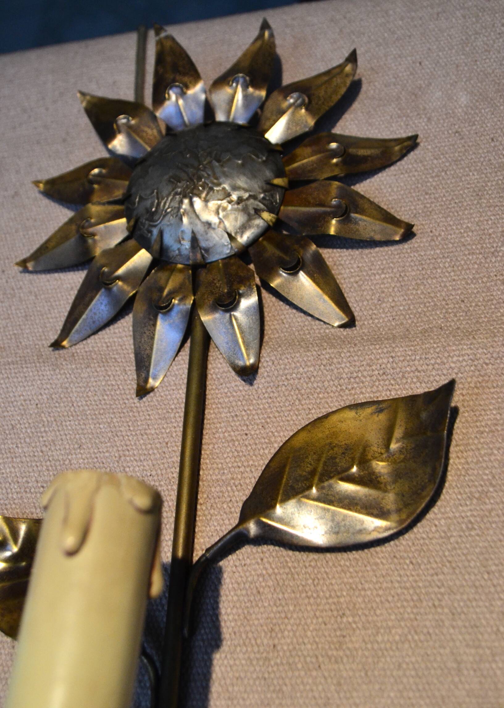 Brass flower wall light from the 1970s.