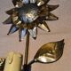 Brass flower wall light from the 1970s.