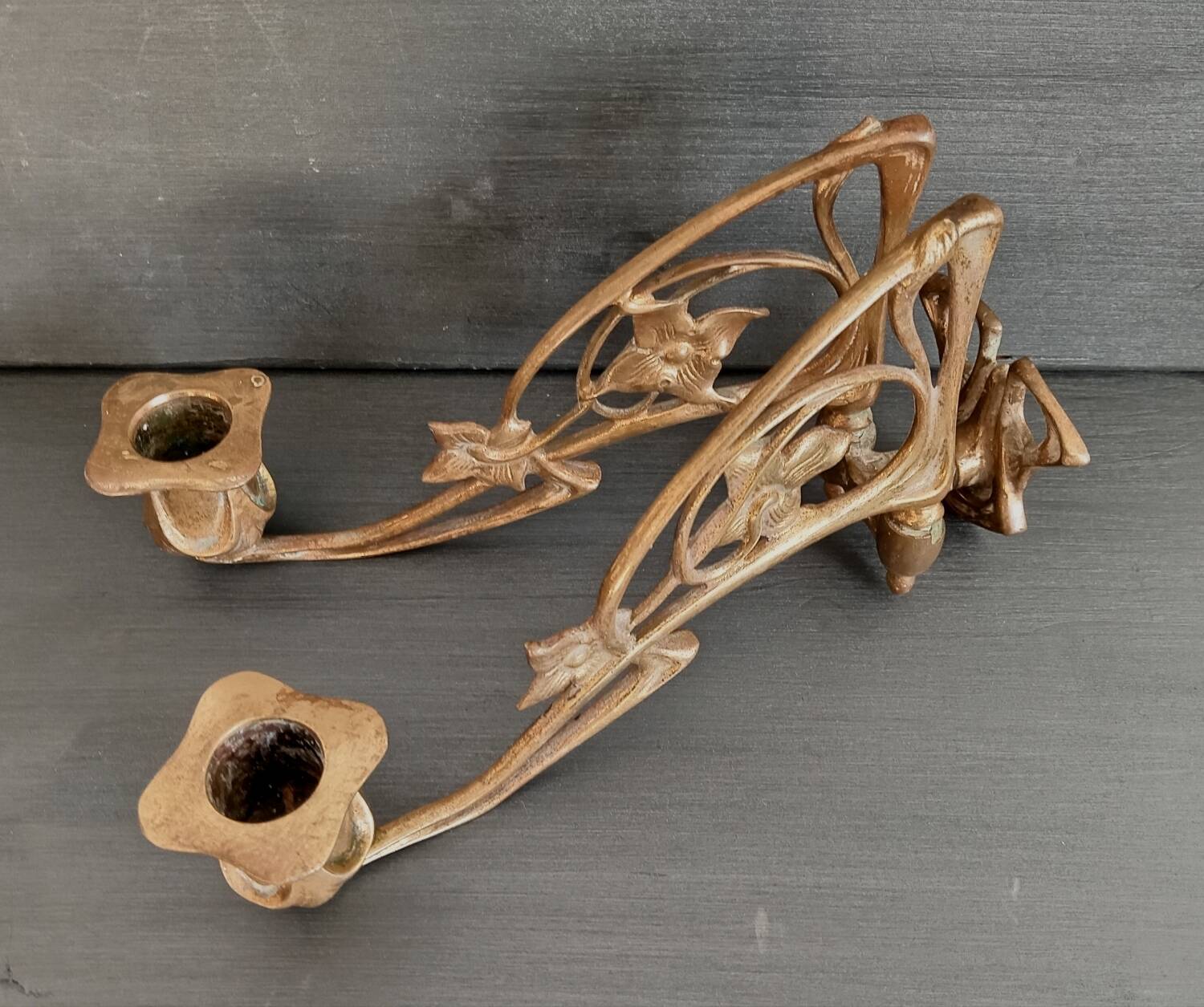 Double candlestick in gilded brass
