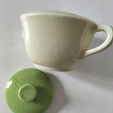 Two sugar bowls and a textured plate in turquoise and green Salins earthenware.