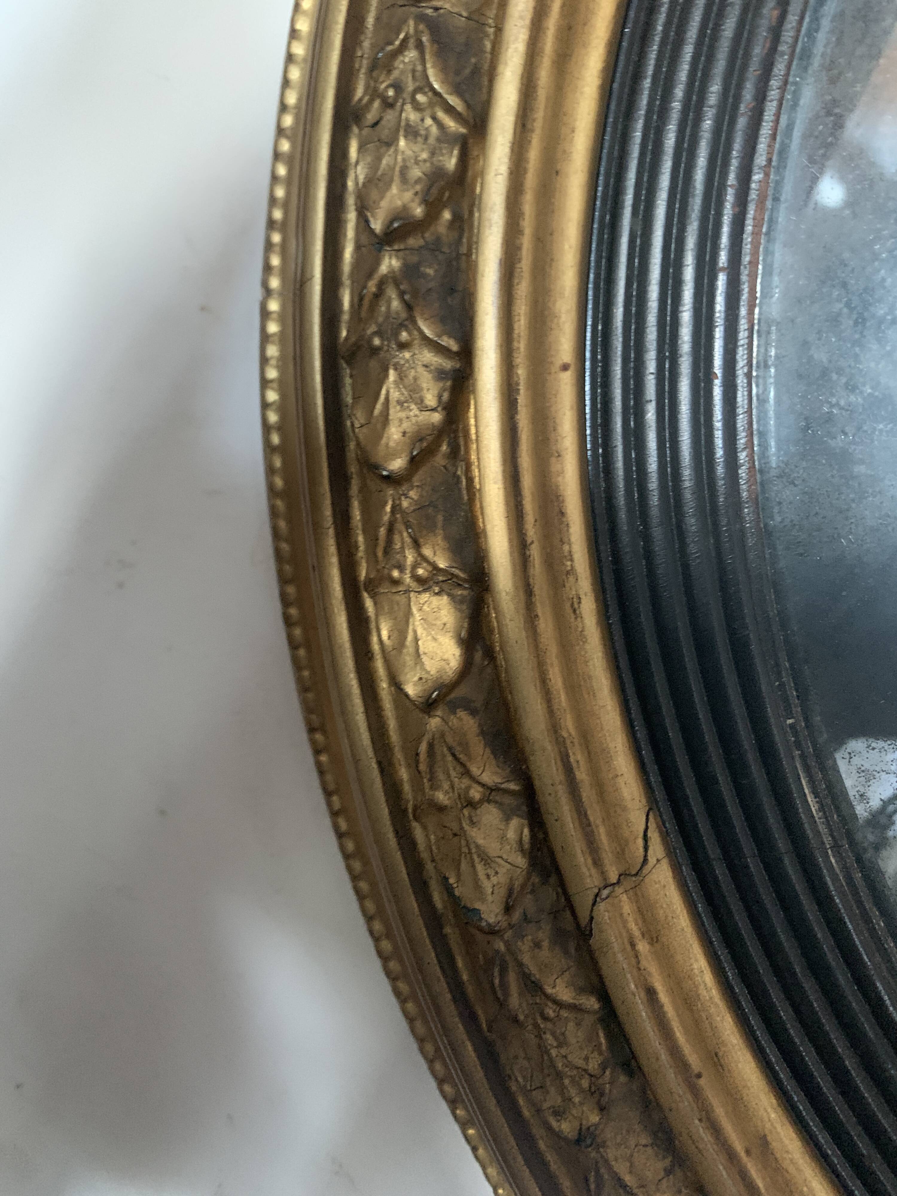 Miroir sorcière en bois sculpté doré XIX siècle