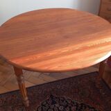 Round table with folding sides