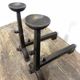 Pair of antique cast iron fire dogs, rustic decor, around 1900.