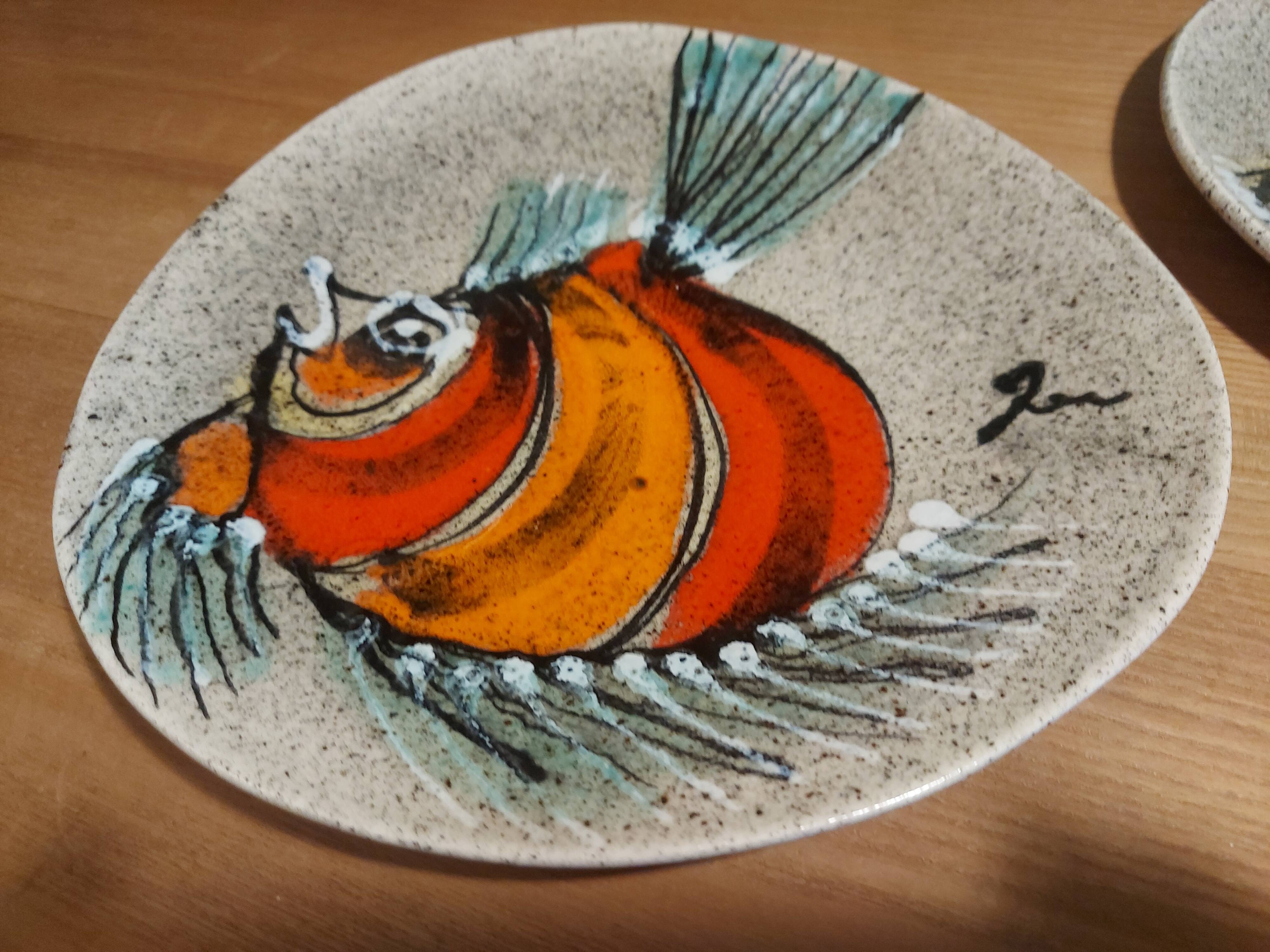 2 vintage ceramic plates with fish decoration