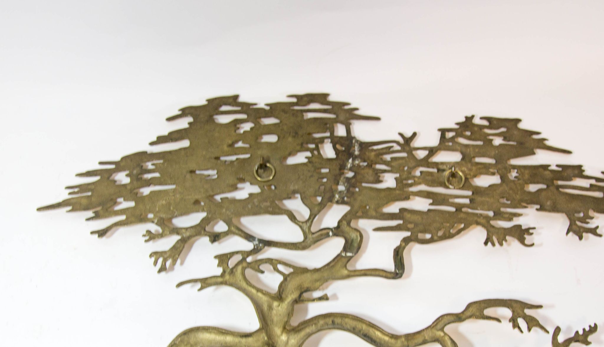 Brass wall sculpture