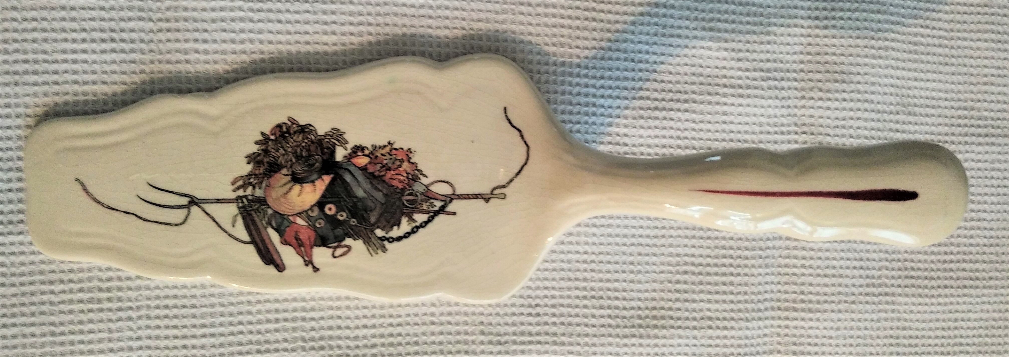 Earthenware pie shovel Obernai décor signed Henri Loux