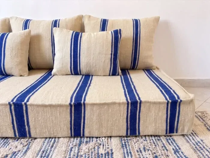 Royal blue striped floor cushion – Hanbel in handwoven ivory wool