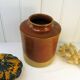 Old grease pot in glazed stoneware and terracotta