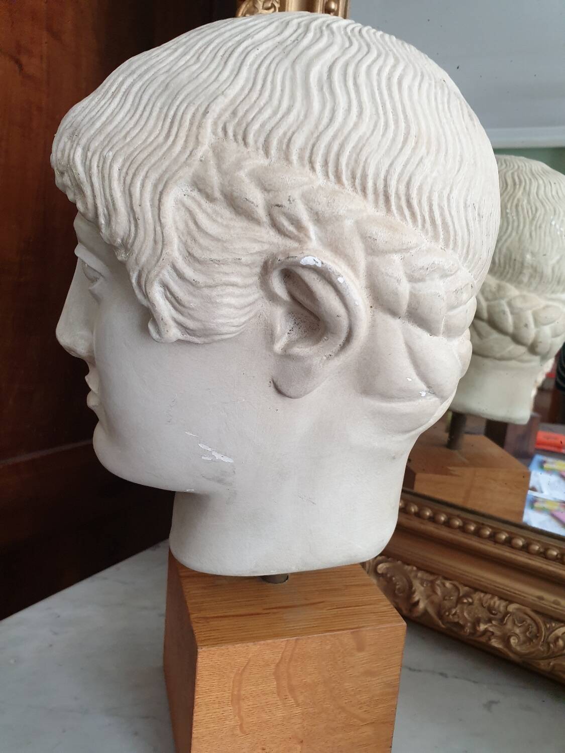 Greek bust of a blond Ephebe