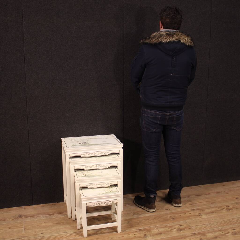 Four French coffee tables in lacquered and painted wood