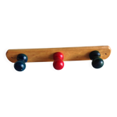 Pine coat rack with three colored heads / vintage 80s