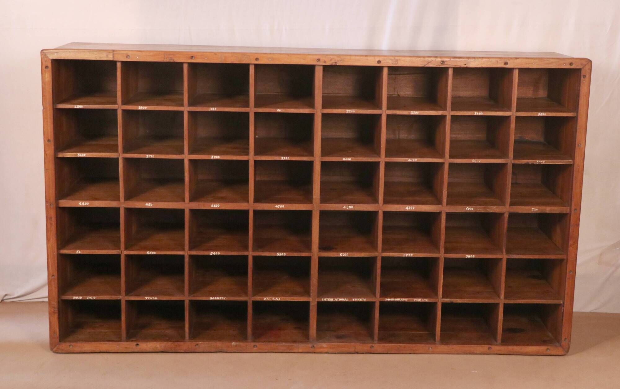 Old professional piece of furniture - postal sorting with 48 lockers in Burmese teak