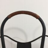 Black lacquered metal and brown leather magazine holders