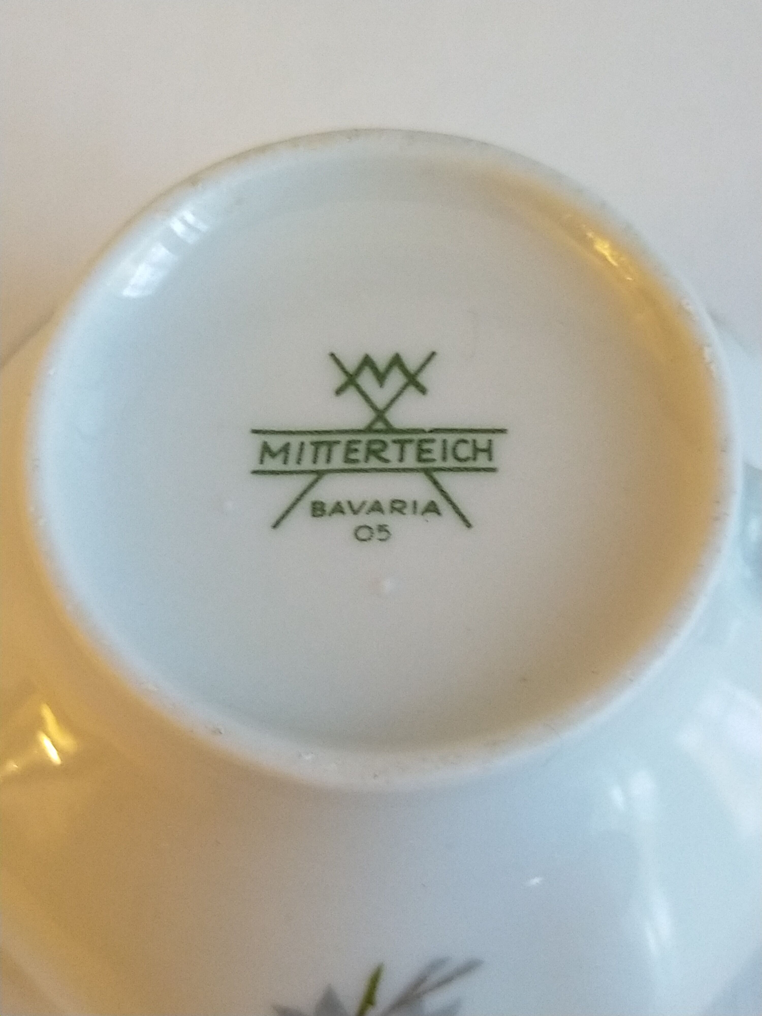 Porcelain cup and under cup