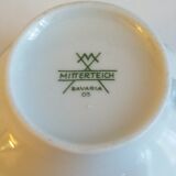 Porcelain cup and under cup