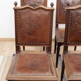 Set of 4 Louis XVI style chairs in carved wood and embossed leather.