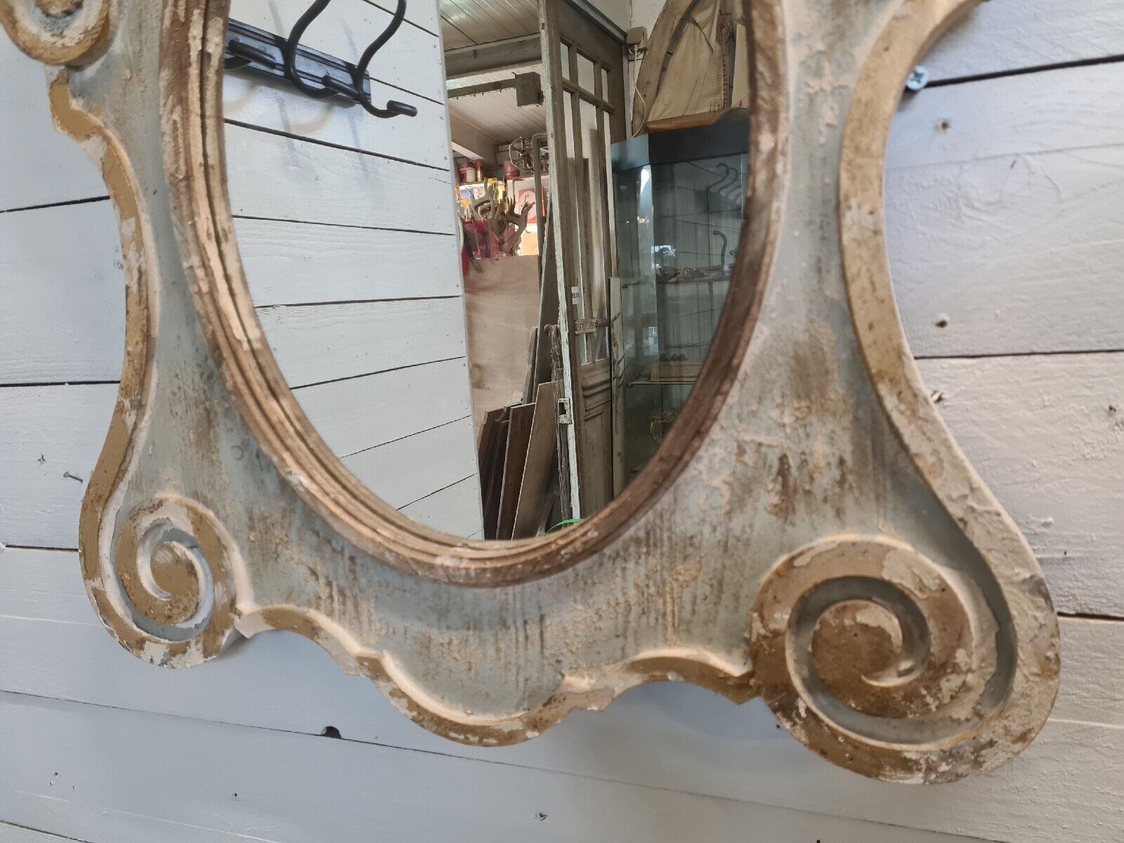 Miroir oeil de boeuf en bois patiné
