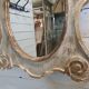 Miroir oeil de boeuf en bois patiné