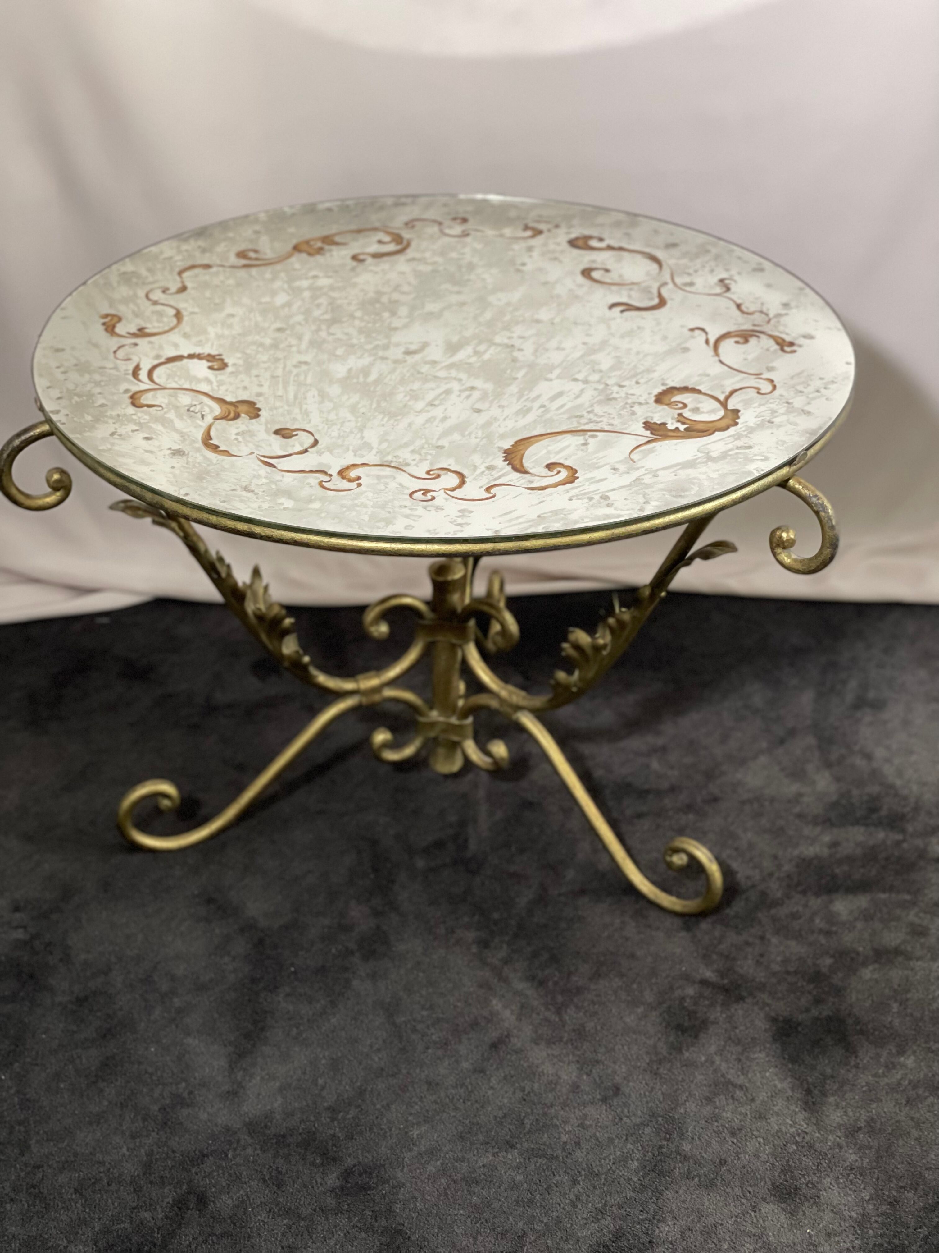 Round coffee table base in gilded wrought iron beautiful top enamelled glass 50s
