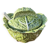 soup tureen with green cabbage and ladle