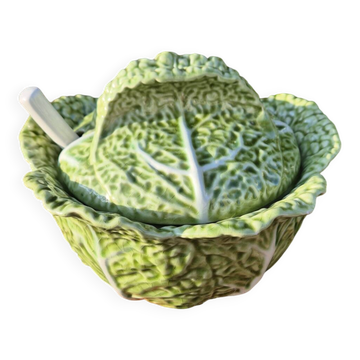 soup tureen with green cabbage and ladle