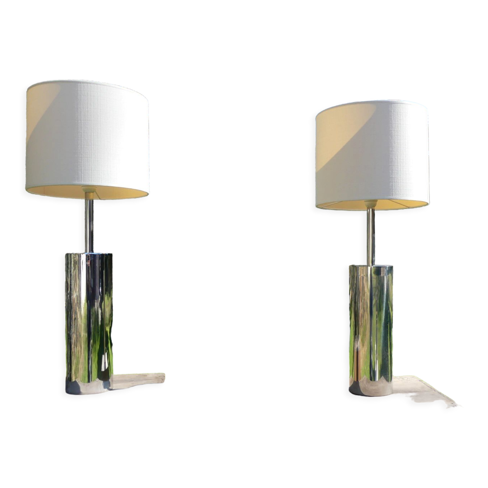 Foot of chrome lamps and ivory white lampshade