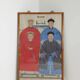 A framed Chinese ancestral portrait is a traditional hand-painted