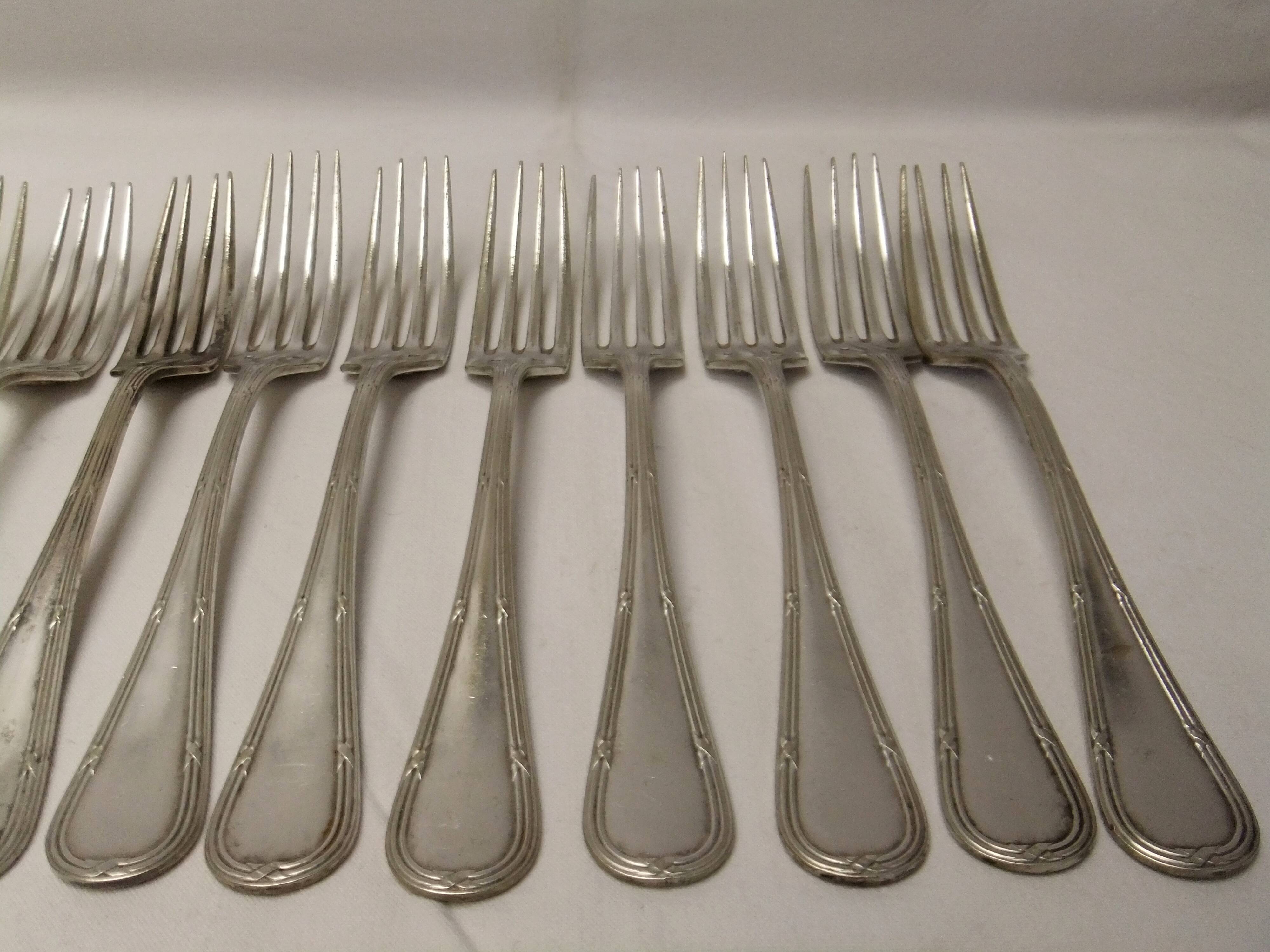 Old Louis XVI service fork with mesh ribbon