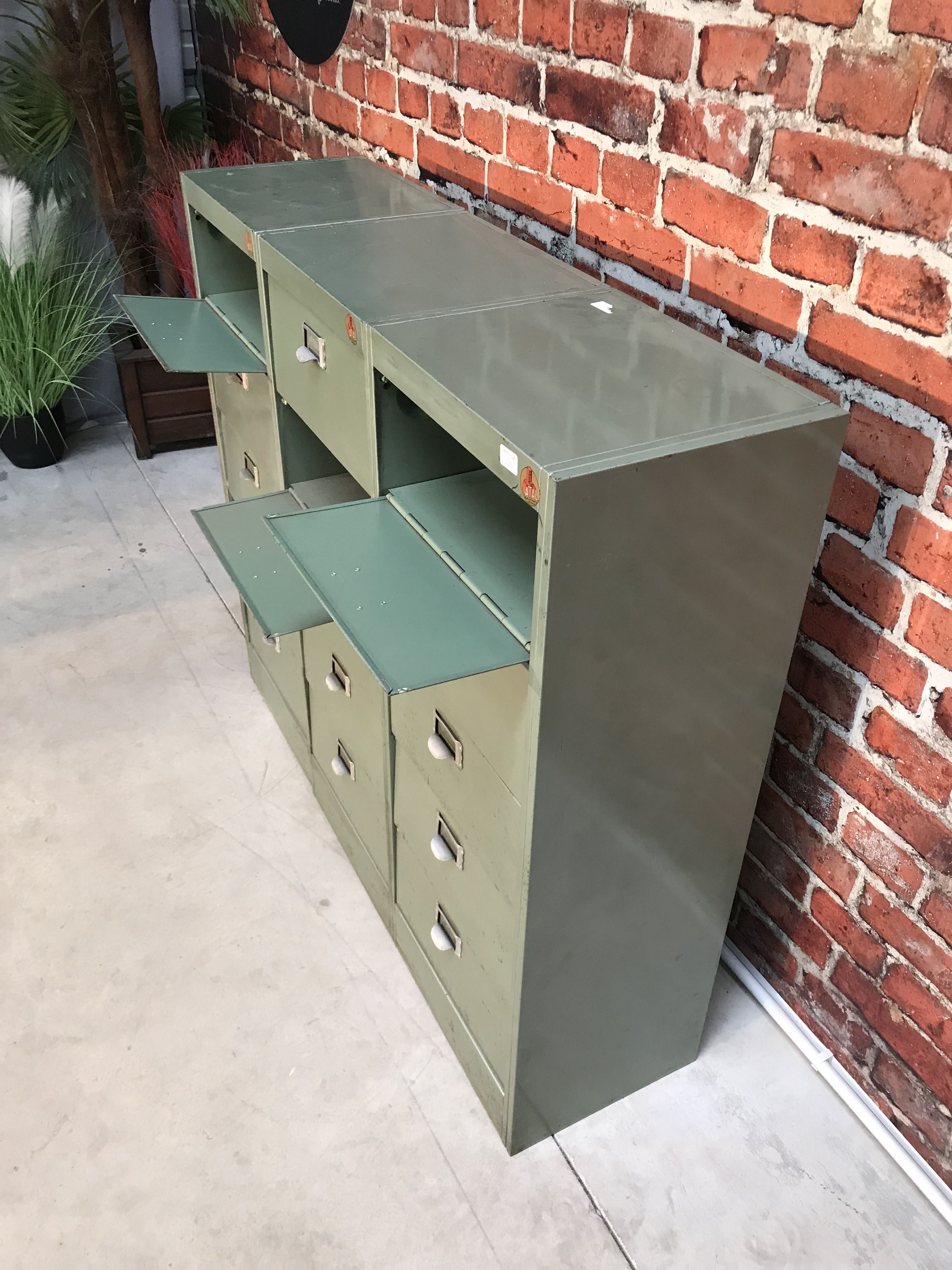 Vintage industrial furniture with metal clamshell atal