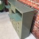 Vintage industrial furniture with metal clamshell atal