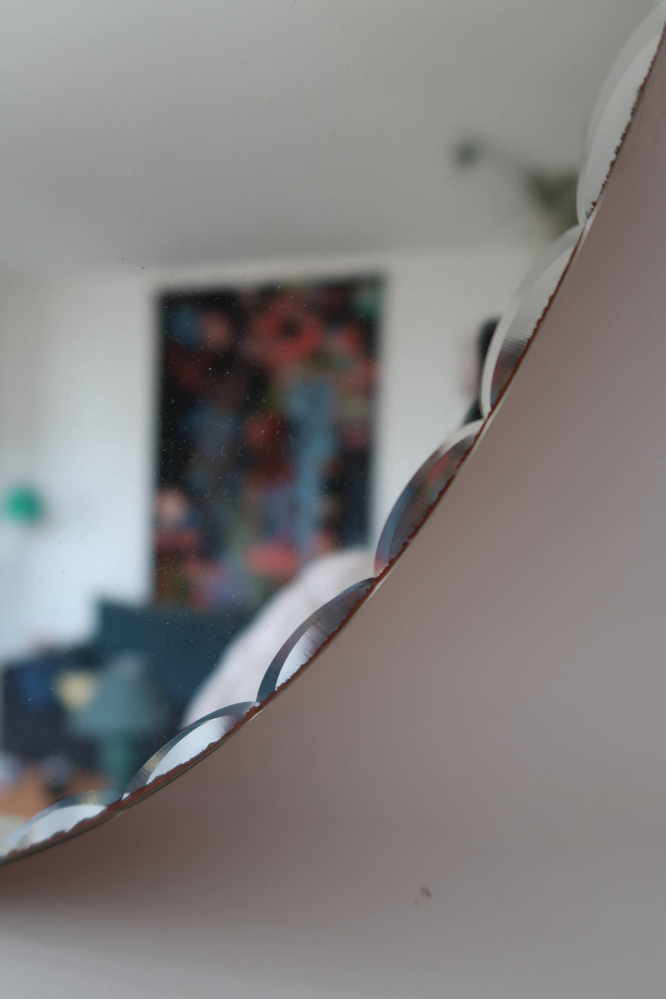 Vintage bevelled oval mirror