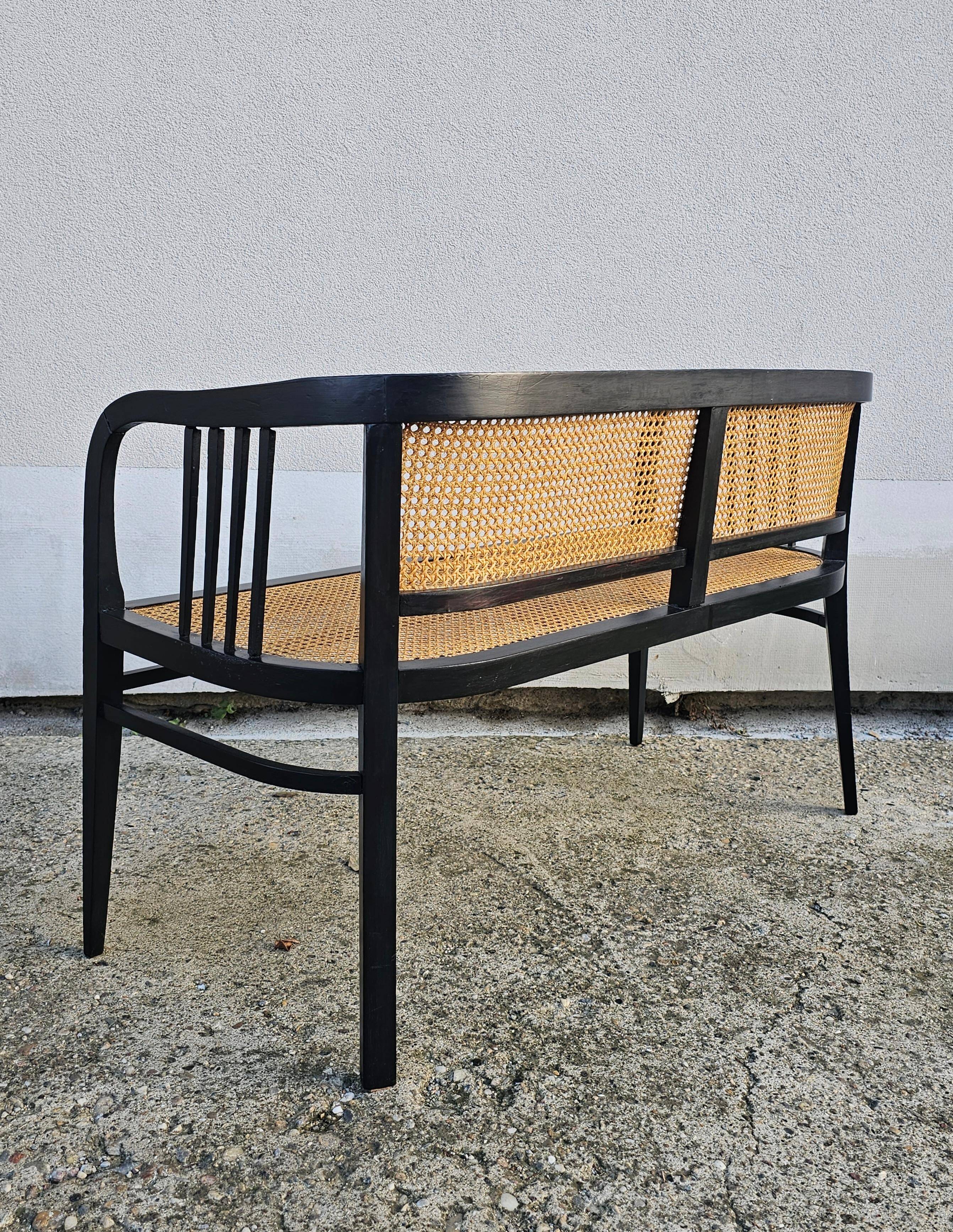 Vienna Secession beech canapé with cane seat and backrest.